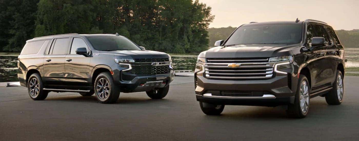 2021 Chevy Suburban and Tahoe parked outside a Chevy dealer near Windsor