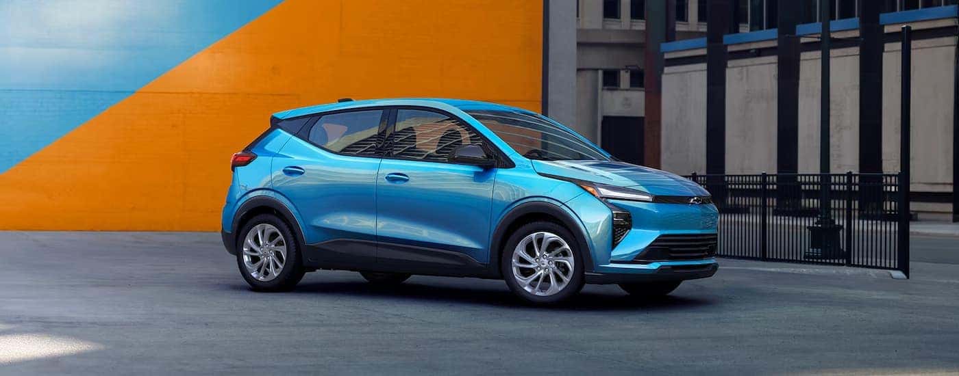 A blue 2027 Chevy Bolt parked for sale