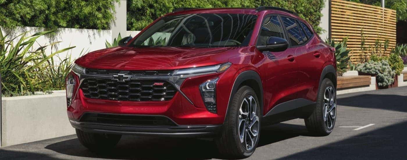 A parked red 2025 Chevy Trax RS for sale near Windsor.