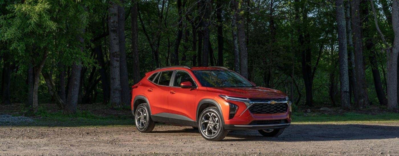 An orange 2026 Chevy Trax from the front at an angle.
