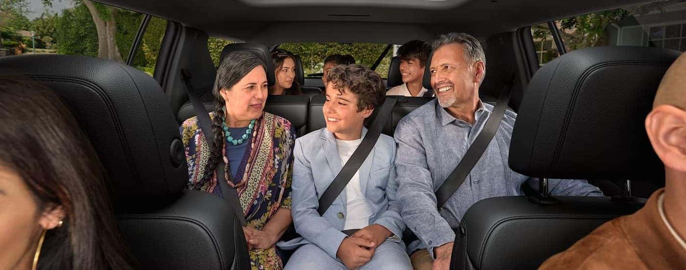 Several passengers in a 2026 Chevy Traverse.