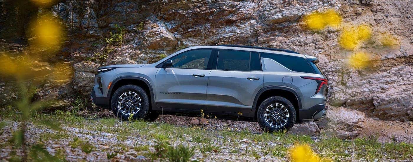 A silver 2026 Chevy Traverse offroad.