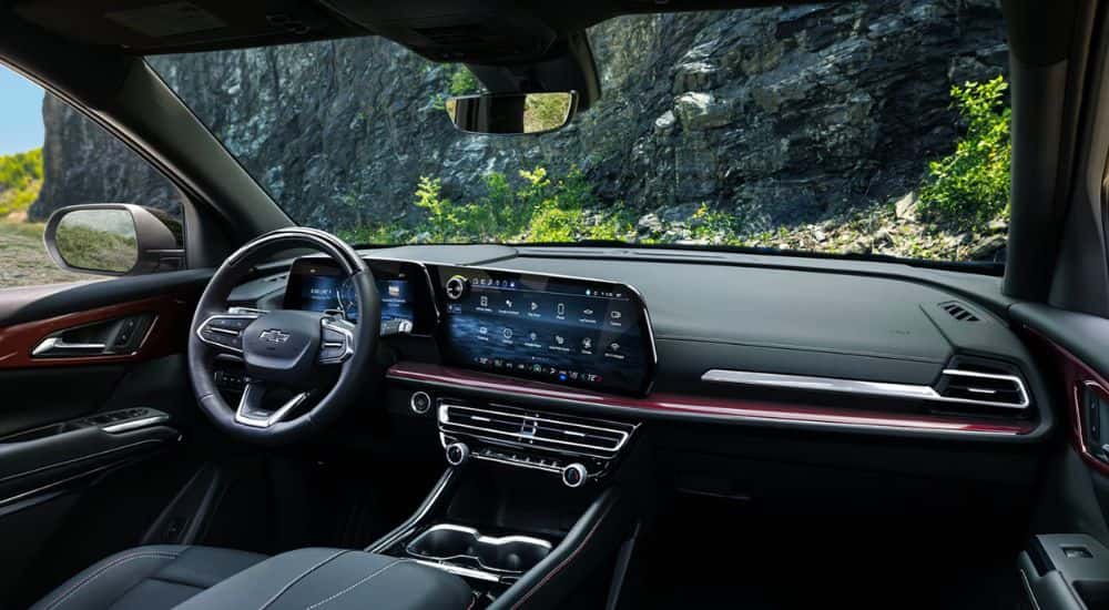 Interior of a 2026 Chevy Traverse Z71 infotainment display and steering wheel.