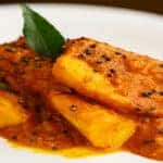 Close up of Indian cuisine with a red sauce