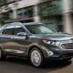 2019 Chevrolet Equinox driving down a street