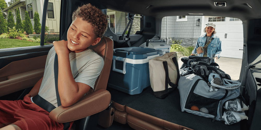 Chevy Suburban interior with family and cargo loaded