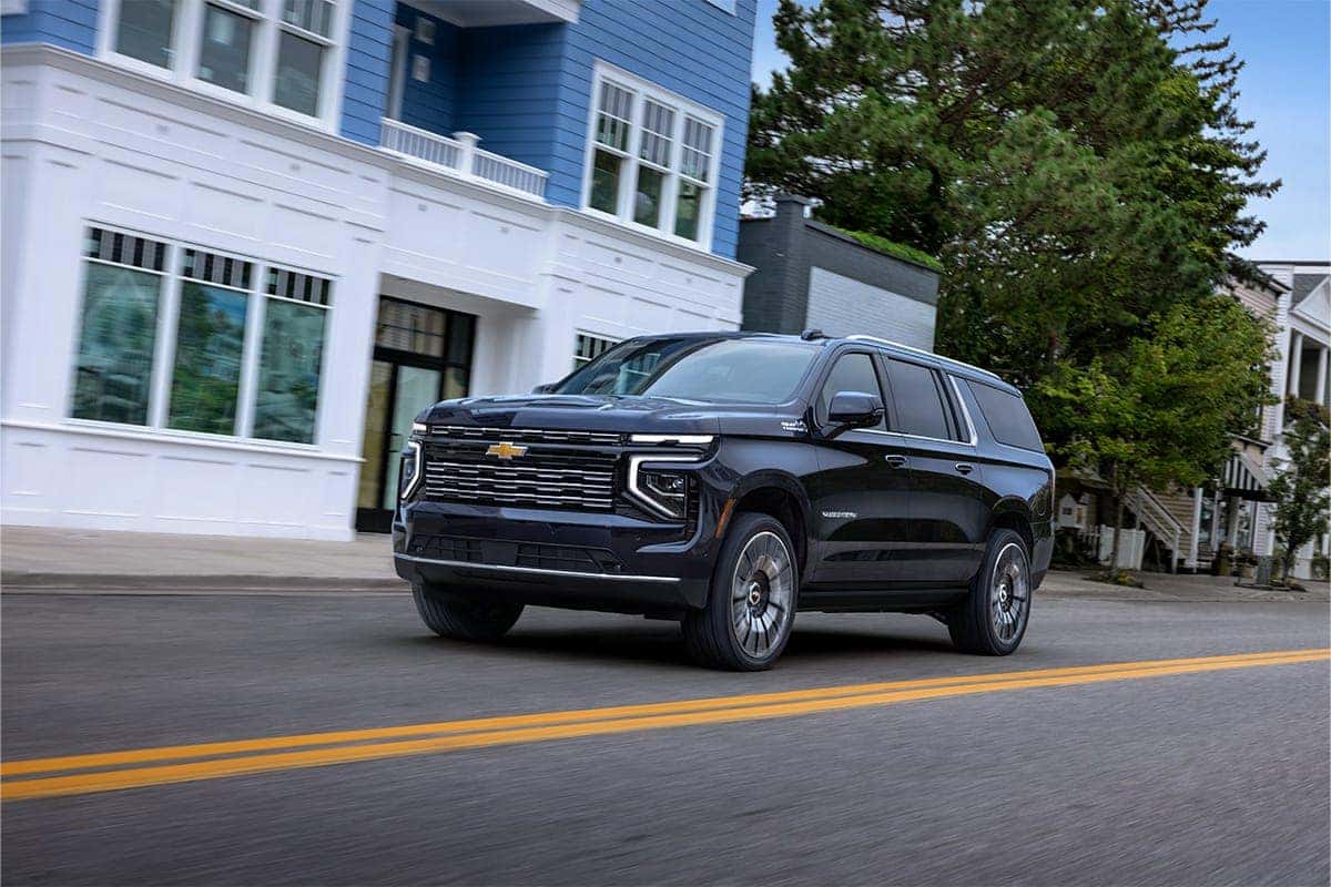 2025 Suburban driving down street