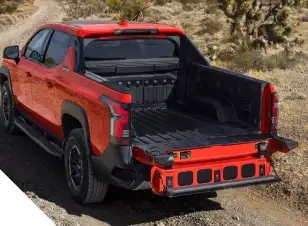 Chevy Silverado extended cab middle seat folded flat cargo floor with ladder transport