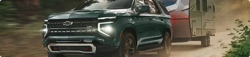 Chevrolet Tahoe towing a trailer with room for the whole family