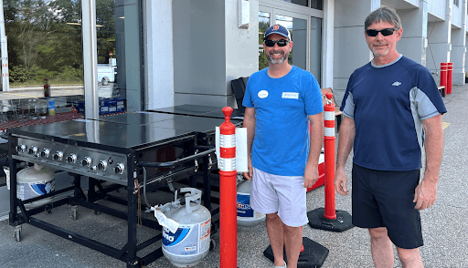 Jeremy and Dave at a grill