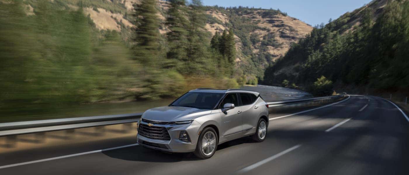 2020 Chevy Blazer driving on a highway in the mountains