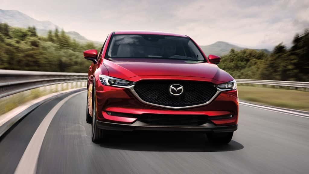 2017 Mazda CX-5 red driving on road