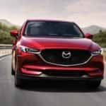 2017 Mazda CX-5 red driving on road