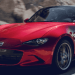 red 2019 Mazda Miata MX-5 roadster driving on mountain road