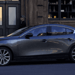 2020 MAZDA3 parked at sunset on city street