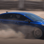 2021 Kia Forte on Highway Banner