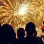 Crowd watching fireworks and celebrating