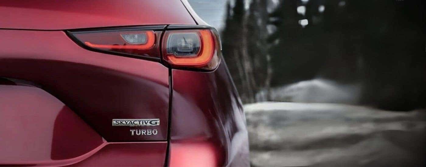 Passenger side taillight on a red 2025 Mazda CX-5 for sale near Coventry.