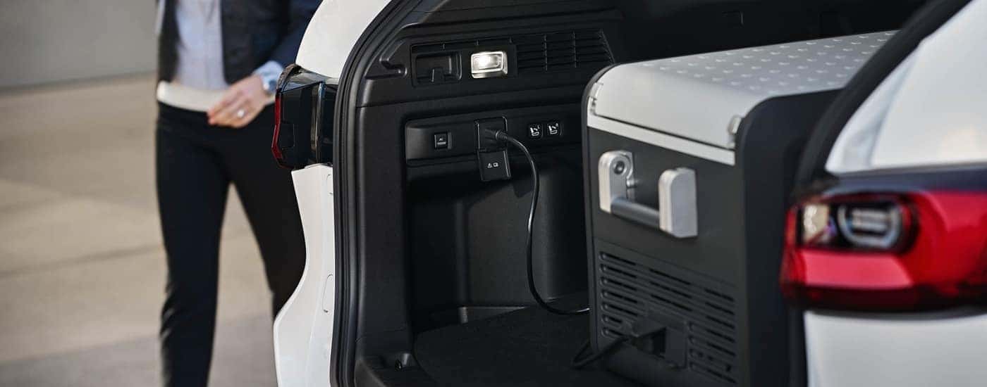 Cooler in the trunk of a white 2025 Mazda CX-70 PHEV