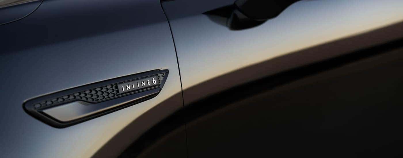 Inline 6 badge on a black 2025 Mazda CX-70 for sale