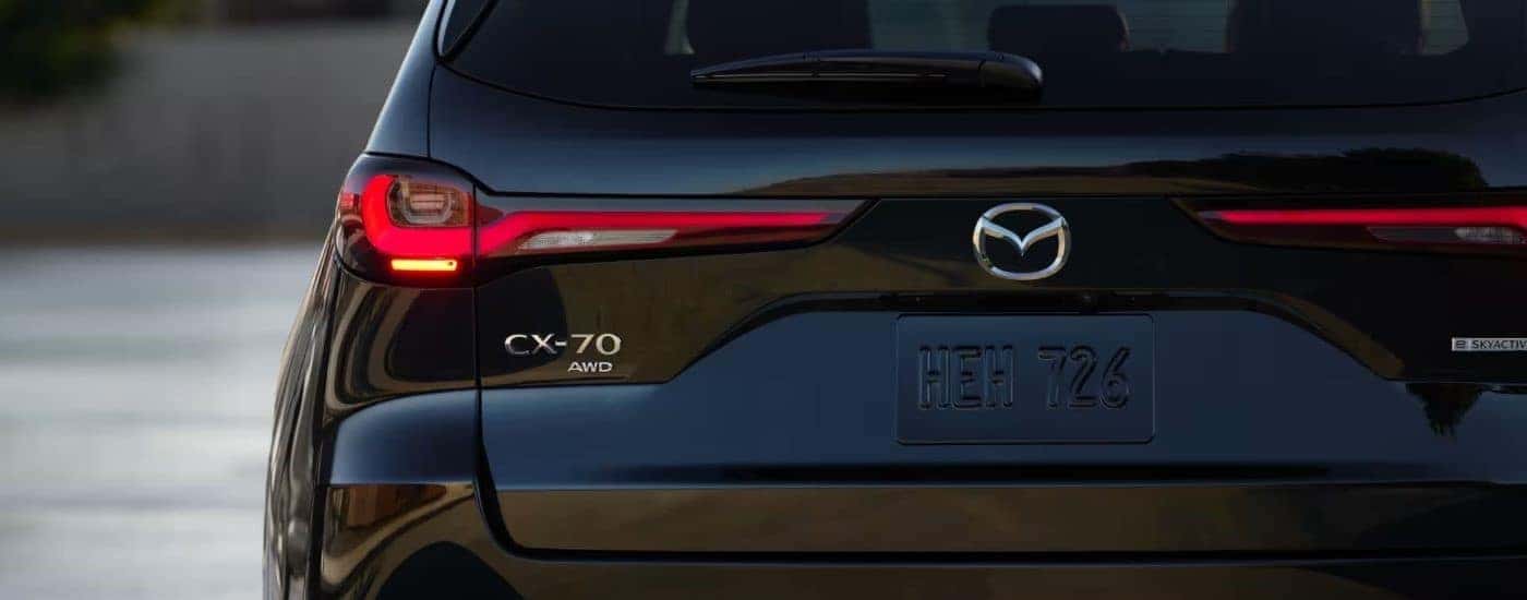 Rear end of a black 2025 Mazda CX-70 for sale in Manchster