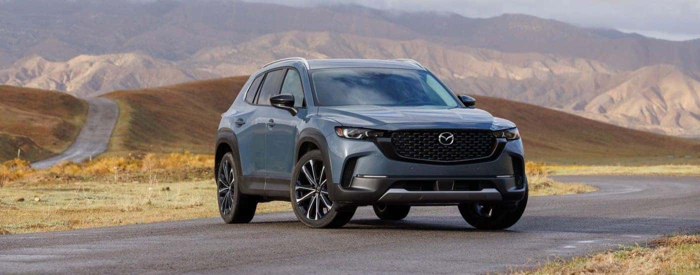 Silver 2023 Mazda CX-50 parked to look at used Mazdas for sale near Glastonbury