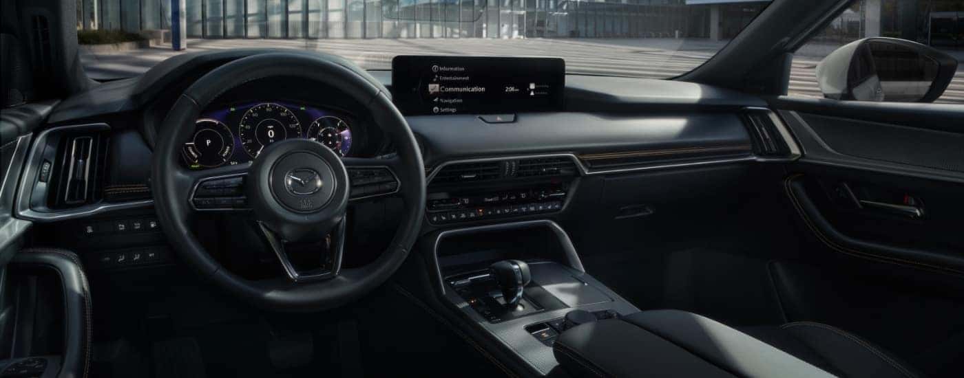 The black interior of a 2025 Mazda CX-90 for sale near Willimantic.