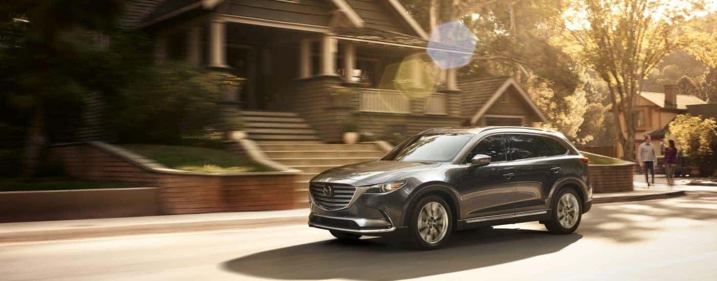Silver 2019 Mazda CX-9 driving to see a used Mazda for sale near Windsor
