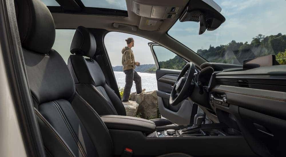 The black interior and dash in a 2026 Mazda CX-50 for sale near Glastonbury.