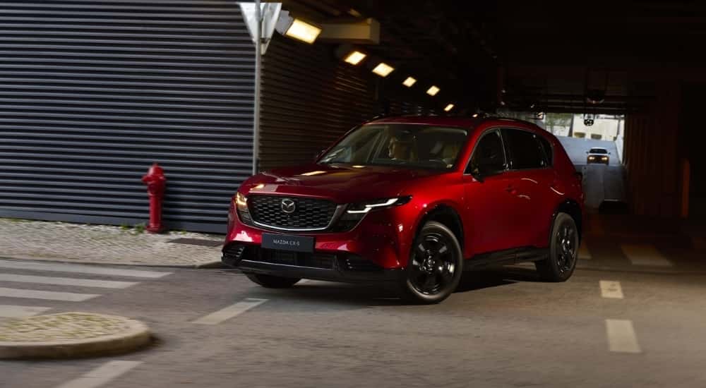 Red 2026 Mazda CX-5 driving through a tunnel