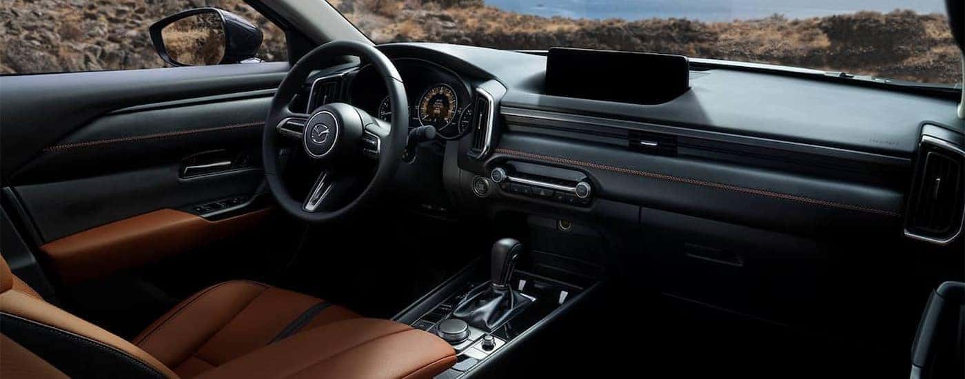 Infotainment and digital gauge cluster on a 2024 Mazda CX-50