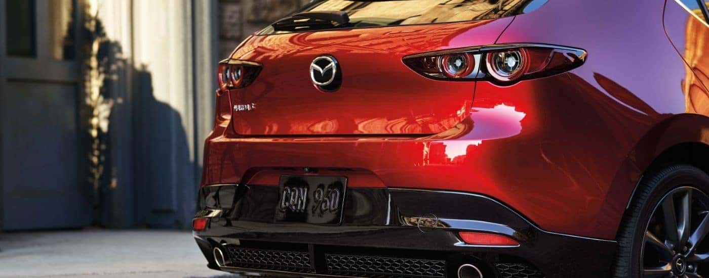 View of rear gate on a red 2026 Mazda3 Hatchback.