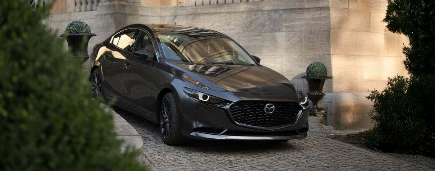 Grey 2026 Mazda3 on a driveway