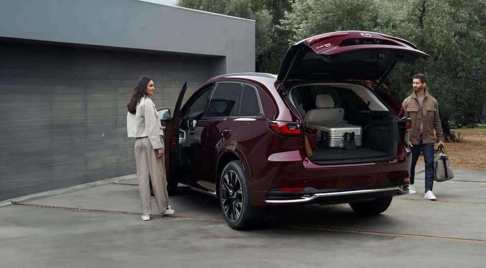 Open hatch on a red 2026 Mazda CX-90.