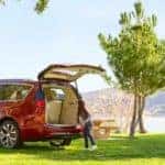 2019 Chrysler Pacifica with Family Storing Cargo in Trunk