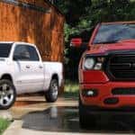 2020 RAM 1500 models parked outside of a barn