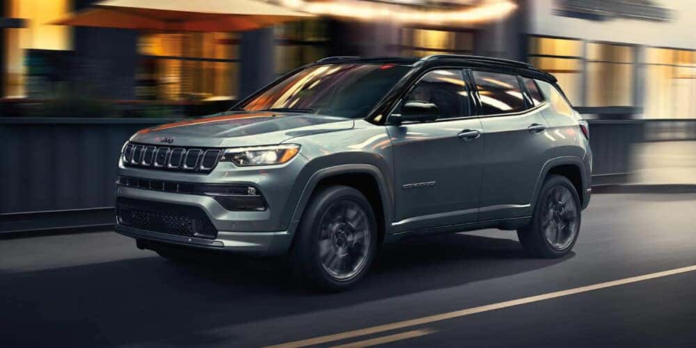 2023 Jeep Compass driving through a city