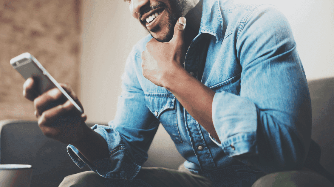 what-to-know-about-chevrolet-mylink-man-using-phone
