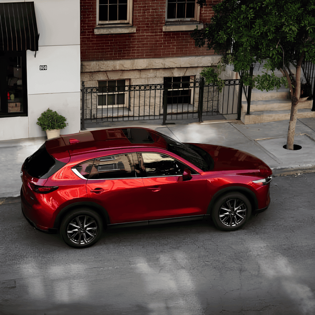 used Mazda SUVs Indianapolis - square image showing an overhead view of a red Mazda SUV