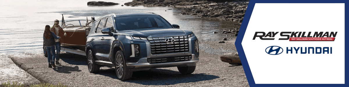 used Hyundai Palisade Franklin, Indiana - blue Palisade pulling a boat near the water - banner image