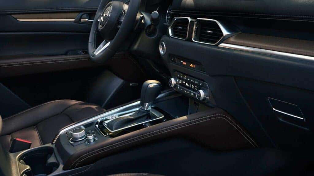 Interior view of a 2025 Mazda3 showcasing modern design and spacious seating arrangement.