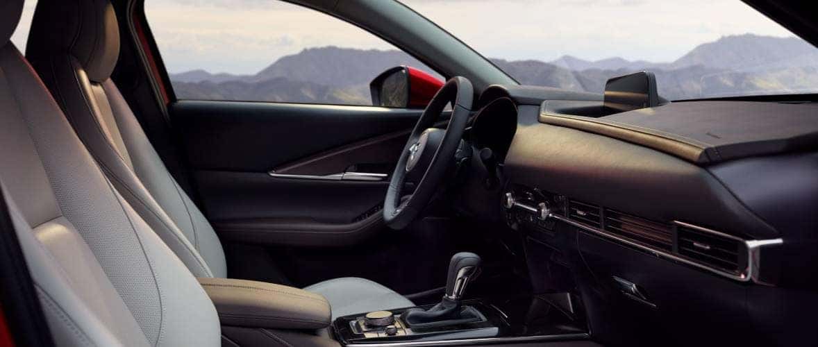 Interior view of a 2025 Mazda3 showcasing modern design and spacious seating arrangement.