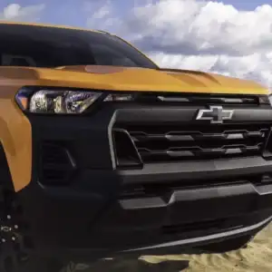 2026 Chevrolet Colorado WT Sunrise Orange on a beach