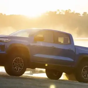 2026 Chevrolet Colorado ZR2 Reef Blue Metallic towing a boat