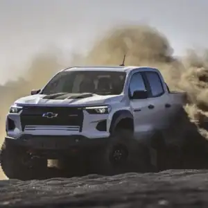 2026 Chevrolet Colorado ZR2 Summit White kicking up dirt