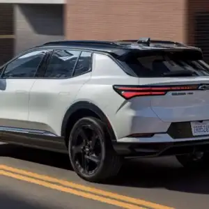 2026 Chevrolet Equinox EV RS Polar White Tricoat in motion