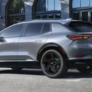 2026 Chevrolet Equinox EV RS Sterling Gray Metallic parked in a city