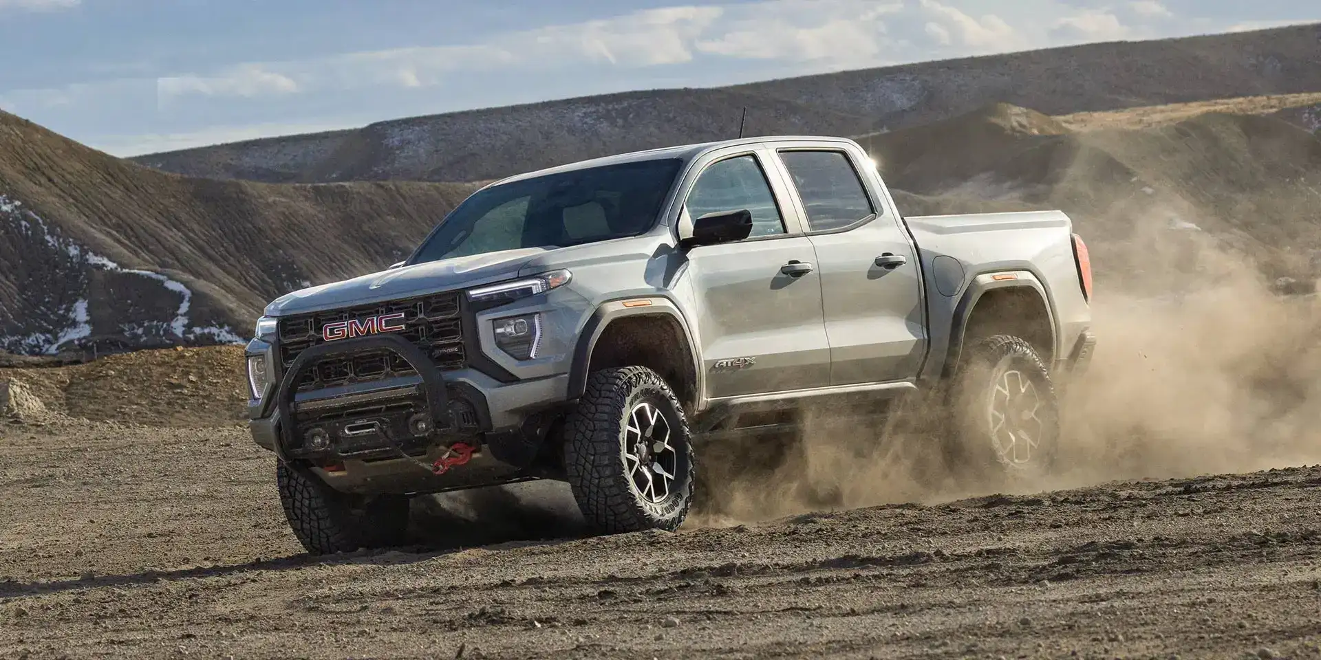 2026 GMC Canyon Sterling Metallic driving off road