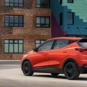 2027 Chevrolet Bolt RS Habanero Orange parked