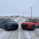 2026 Chevrolet Equinox and 2026 Chevrolet Trailblazer parked on a snowy gravel road in northeastern South Dakota